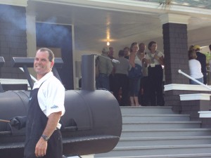 Tom cooking at the grill during a Shaws catered event