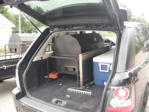Small DIY pig roast BBQ in SUV