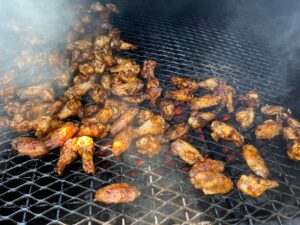 Chicken wings on the grill look DELICIOUS