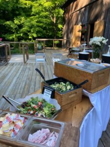 Shaws Catering bbq buffet looks perfect on the barn's main deck