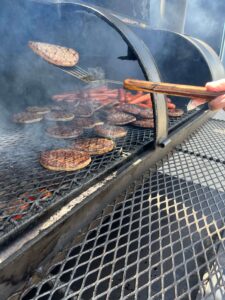 The Shaws Catering grill cooks up some delicious burgers and hot dogs for the Oro-Medonte staff