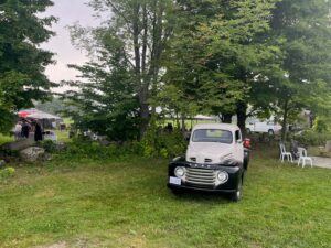 Antique car on the property at the tent wedding in Oro-Medonte