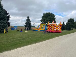Fun for all ages - bouncy castles, lawn Jenga, dunk tank, and connect four. What a picnic!!
