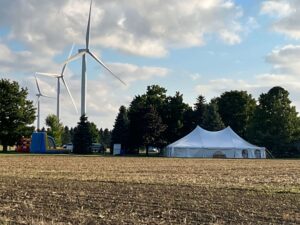 The wind kept the turbines moving but the sound was peaceful at the HJV Equipment Company picnic