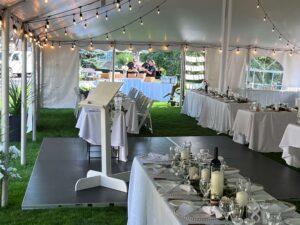 The tent and tables are beautifully decorated creating a stunning reception area