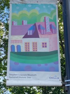 A banner noting the Stephen Leacock Museum as a National Historic Site