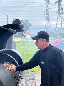 Tom tends the grill at Miller Waste Staff Appreciation Event