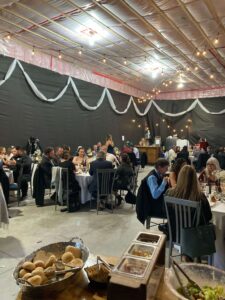 Guests enjoy dinner at the Ferguson's WEdding in EAst Oro