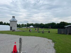 Guests enjoy a game of corn hole on the expansive property at Quayle's Brewery