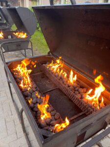 Coals are getting hot as the bbq is fired up
