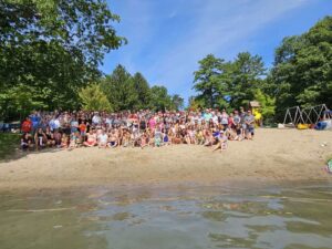 the Scarlet Park community on the beach at their 100th anniversary party